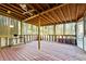 Spacious screened porch with wooden deck flooring at 4522 Karron Ln, Powder Springs, GA 30127