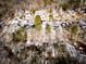 Community overview with snow-covered homes and trees at 95 Brandon Dr, Covington, GA 30016