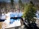 House nestled in wooded neighborhood, snow covered at 95 Brandon Dr, Covington, GA 30016