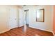 Bright bedroom with wood-look floors and ample closet space at 95 Brandon Dr, Covington, GA 30016
