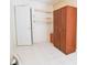 Bedroom with wood closet and floating shelves at 95 Brandon Dr, Covington, GA 30016