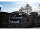 Entrance sign for Woodland Ridge community at 95 Brandon Dr, Covington, GA 30016