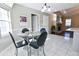 Bright dining area with glass top table and seating for four at 95 Brandon Dr, Covington, GA 30016