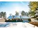 Charming one-story house with snow covered roof and landscaping at 95 Brandon Dr, Covington, GA 30016