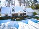 Charming house with snow-covered roof and yard at 95 Brandon Dr, Covington, GA 30016