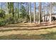 Spacious backyard with grassy area, partially fenced at 4611 Eberline Ct, Stone Mountain, GA 30083