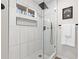 Stylish bathroom with a large walk-in shower and hexagon tile at 4611 Eberline Ct, Stone Mountain, GA 30083