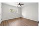 Spacious bedroom with hardwood floors and large windows at 4611 Eberline Ct, Stone Mountain, GA 30083