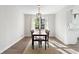 Charming dining room with hardwood floors and a modern light fixture at 4611 Eberline Ct, Stone Mountain, GA 30083