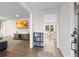 Bright and spacious entryway with hardwood floors and views into the living and dining areas at 4611 Eberline Ct, Stone Mountain, GA 30083