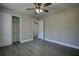 Bright bedroom featuring hardwood floors and ample closet space at 3160 E Chapel Cir, Decatur, GA 30034