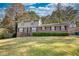 Brick house with a two-car garage and spacious yard at 3160 E Chapel Cir, Decatur, GA 30034