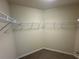 Large walk-in closet with wire shelving at 1622 Marsanne Nw Ter # 26, Kennesaw, GA 30152