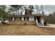 Tan brick ranch house with a covered entry and small front yard at 3770 Larkspur Ter, Decatur, GA 30032