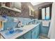 Retro bathroom with light blue tile and double vanity at 3781 Narmore Ne Dr, Atlanta, GA 30319