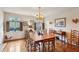 Spacious dining room featuring hardwood floors and charming window details at 3781 Narmore Ne Dr, Atlanta, GA 30319