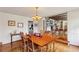 Bright dining room with hardwood floors and a view into the living room at 3781 Narmore Ne Dr, Atlanta, GA 30319