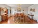 Bright dining room with hardwood floors and a large table at 3781 Narmore Ne Dr, Atlanta, GA 30319