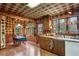 Kitchen with wood cabinets, tile floor and a built-in breakfast nook at 3781 Narmore Ne Dr, Atlanta, GA 30319