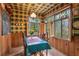 Kitchen breakfast nook with wood walls and plaid ceiling at 3781 Narmore Ne Dr, Atlanta, GA 30319