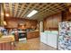Kitchen with wood cabinets, tile floors, and includes washer and dryer at 3781 Narmore Ne Dr, Atlanta, GA 30319