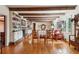 Living room with hardwood floors, exposed beams, and a fireplace at 3781 Narmore Ne Dr, Atlanta, GA 30319