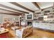 Spacious living room with hardwood floors, fireplace, and built-in shelves at 3781 Narmore Ne Dr, Atlanta, GA 30319