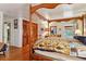 Main bedroom with four poster bed and access to exterior at 3781 Narmore Ne Dr, Atlanta, GA 30319