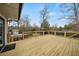 Large, new wooden deck offering an inviting space for relaxation and entertaining guests at 490 Rock Springs Ne Rd, Atlanta, GA 30324