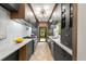 Sleek kitchen features modern appliances, stylish cabinetry, and a door to the backyard at 490 Rock Springs Ne Rd, Atlanta, GA 30324
