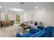 Bright living space with sofa, chairs, dining area, and access to a deck at 490 Rock Springs Ne Rd, Atlanta, GA 30324