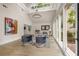 Bright sunroom with soaring ceilings and modern furniture at 490 Rock Springs Ne Rd, Atlanta, GA 30324
