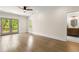 This main bedroom features hardwood floors, natural light, and a connected bathroom at 490 Rock Springs Ne Rd, Atlanta, GA 30324