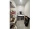 Vanity area with shelves, drawers, and a makeup mirror for beauty routines at 1876 Connally Dr, East Point, GA 30344