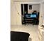 Compact workstation area featuring two monitors, keyboard and speakers at 1876 Connally Dr, East Point, GA 30344