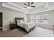 Large main bedroom with tray ceiling and lots of natural light at 2554 Morgan Place Dr, Buford, GA 30519