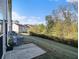 Private backyard with patio, providing a tranquil space at 566 Maggie Ln, Jonesboro, GA 30238