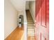 Bright entryway with hardwood floors and staircase at 566 Maggie Ln, Jonesboro, GA 30238