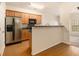 Kitchen with stainless steel appliances and wood cabinets at 566 Maggie Ln, Jonesboro, GA 30238