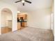 Open living room with kitchen access at 566 Maggie Ln, Jonesboro, GA 30238