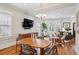 Mid-century modern dining room with hardwood floors and chandelier at 590 Boulevard Se, Atlanta, GA 30312