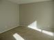Neutral-toned bedroom with carpet flooring and ample natural light at 9400 Roberts Dr # 1C, Atlanta, GA 30350