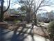 Single-story house exterior with surrounding trees at 9400 Roberts Dr # 1C, Atlanta, GA 30350