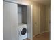 Stackable washer and dryer in a closet at 9400 Roberts Dr # 1C, Atlanta, GA 30350