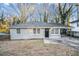 Charming ranch home with gray brick exterior and carport at 2224 Polar Rock Sw Ave, Atlanta, GA 30315