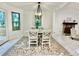 Dining area with farmhouse table and chandelier, marble floors at 331 Old Brock Rd, Rockmart, GA 30153