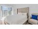 Spacious bedroom with plush bed and sliding door access to balcony at 525 Parkway Ne Dr # 404, Atlanta, GA 30354