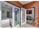 Private patio with sliding glass doors leading to bedroom and living area at 525 Parkway Ne Dr # 404, Atlanta, GA 30354