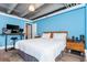 Bright bedroom with light blue walls and hardwood floors at 2479 Peachtree Ne Rd # 202, Atlanta, GA 30305