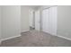 Spacious bedroom with neutral carpeting and double door closet at 748 Amber Nw, Atlanta, GA 30331
